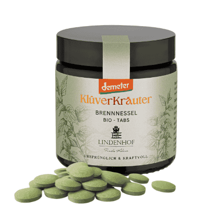 Reine Brennnessel Tabs in Demeter-Qualität, nachhaltig produziert und frei von Zusätzen, präsentiert in umweltfreundlichem Glastiegel.